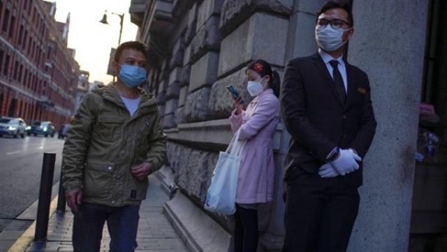 الصين تعلن تسجيل 14 إصابة جديدة بفيروس كورونا